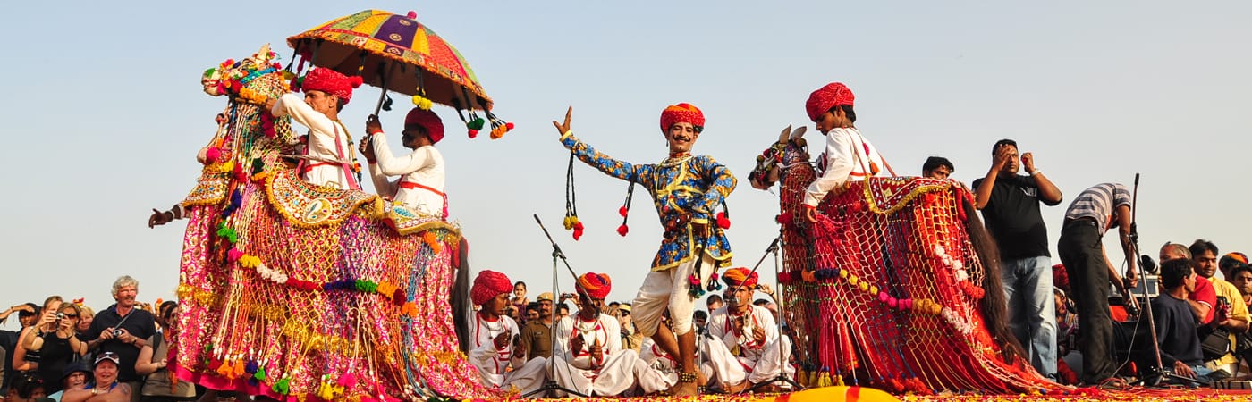 Kutchi tribal community members in traditional attire at Kutch festival celebration"